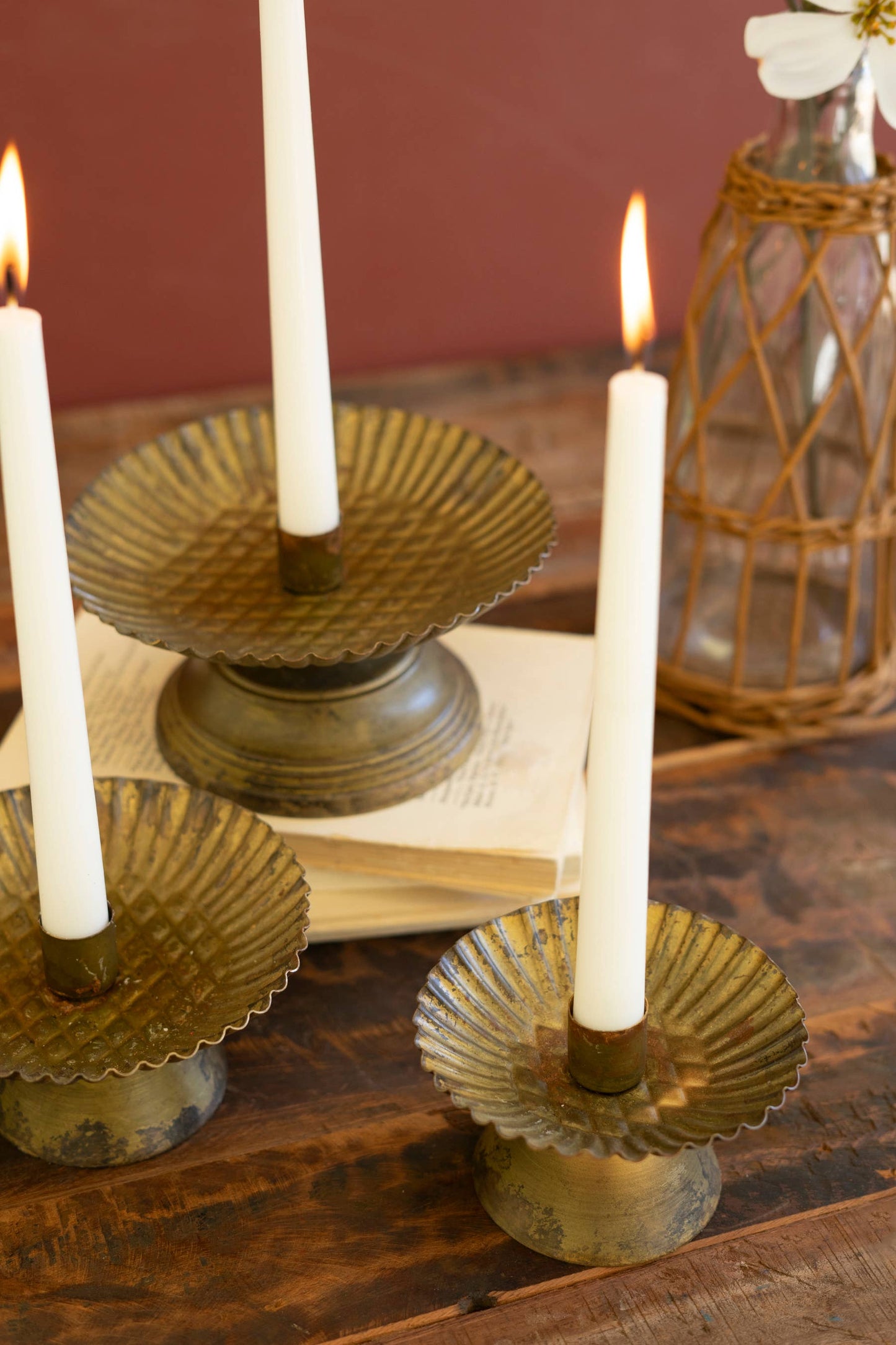SET OF THREE TAPER CANDLE HOLDERS W FLUTED BASES -ANT GOLD: Gold / Metal / Large: 7"d x 3.5"t;
Medium: 5.75"d x 2.75"t;
Small: 4.5"d x 2.75"t